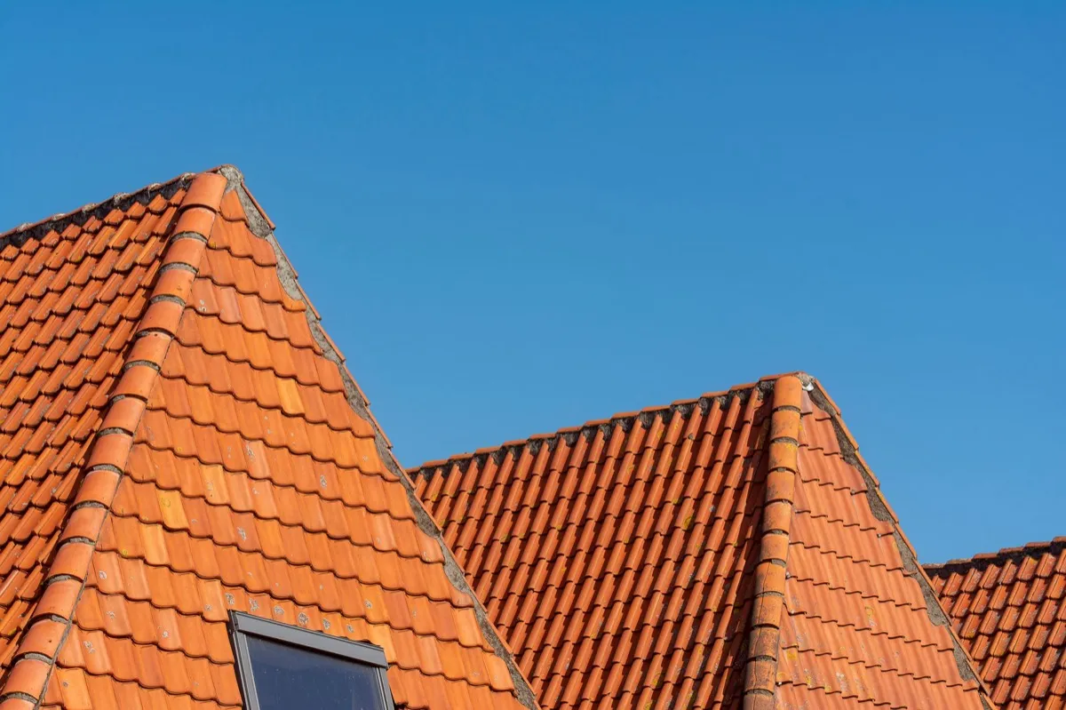 Clay barrel tile rooflines on homes in Tupelo, MS