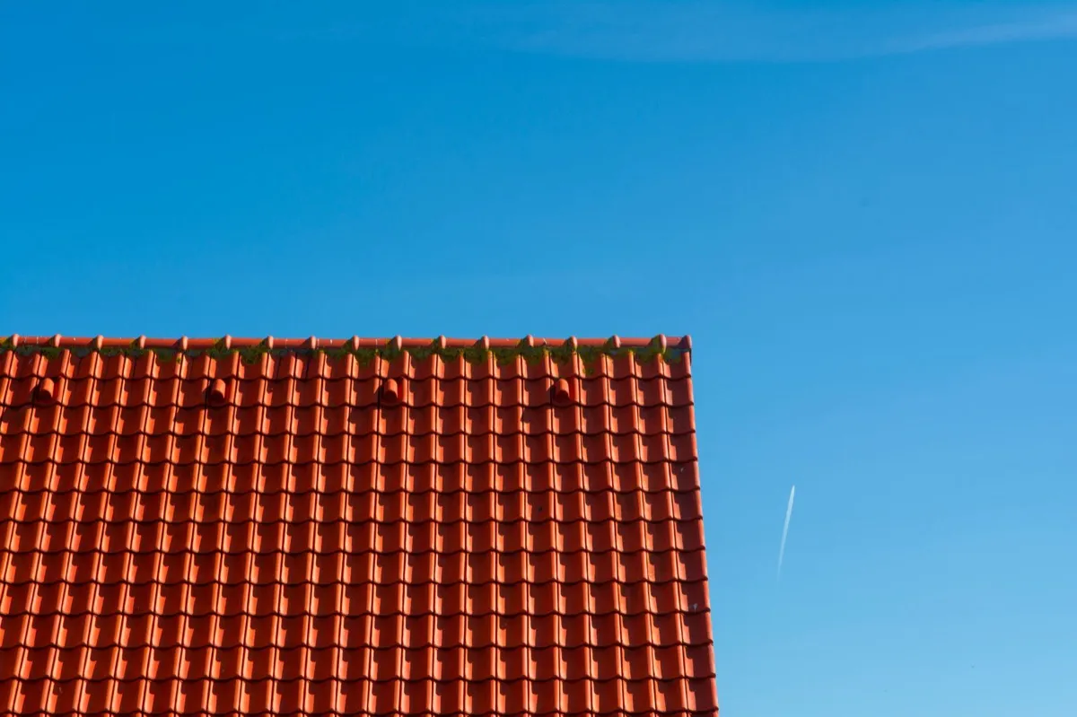 Tile roof gable in full sun, the kind of exposure that sets roof life in Tupelo, MS
